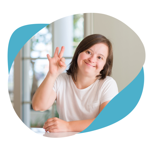 Personalized Disability Resources-Girl with down syndrome smiling and waving